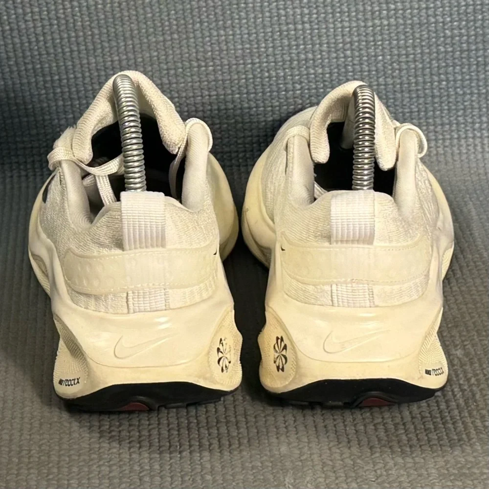Nike Women's White Cream Running Shoes with Black Swoosh